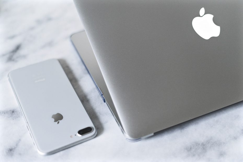 silver iphone 6 on white table