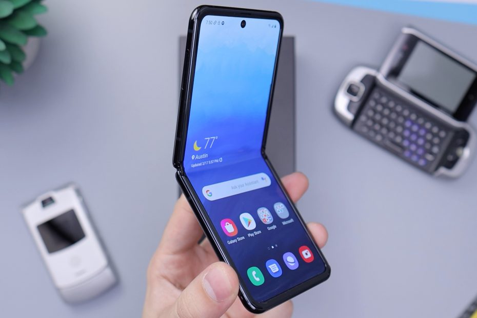 person holding white android smartphone