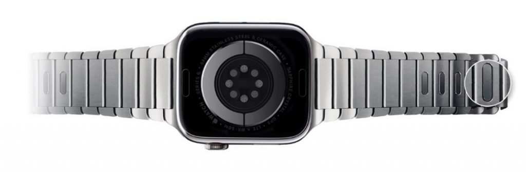 Quick release buttons on watch band links.